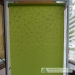 Roller blinds light green fabric no side channels