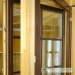 Operable wood windows with grids on the glazing